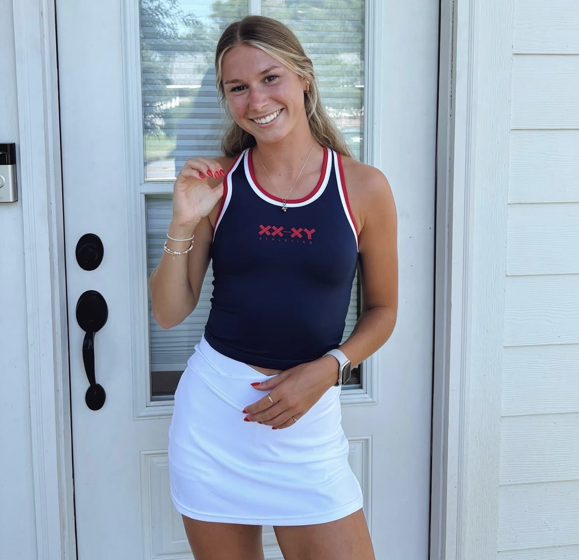 Ainsley Erzen wearing an XX-XY Athletics top